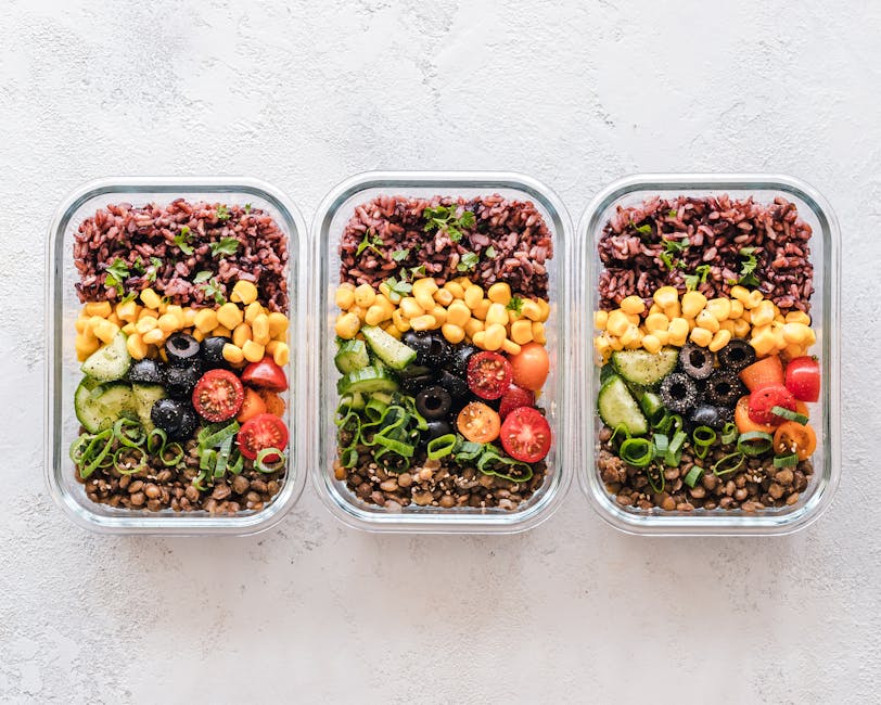 Organized meal prep containers with healthy food portions